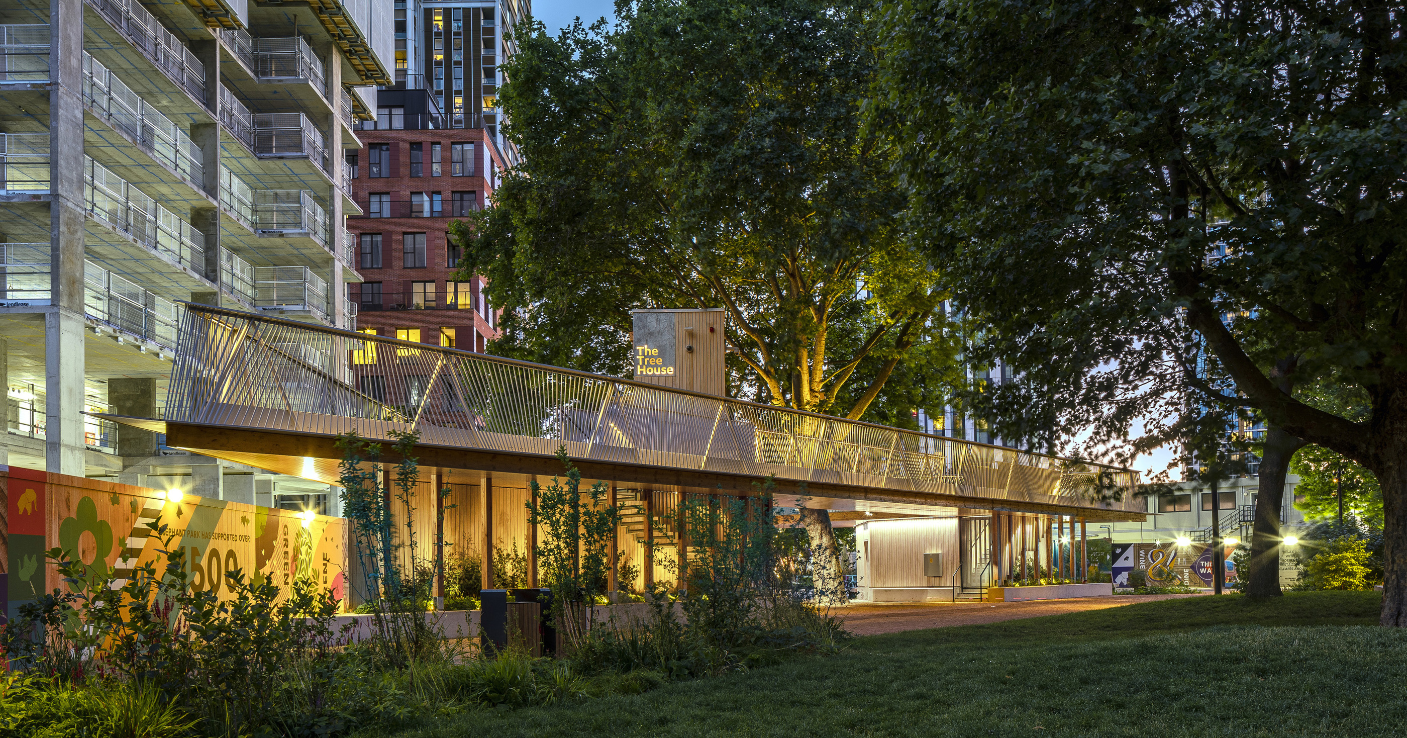 The Tree House at Elephant Park lets warm light gather beneath a canopy.