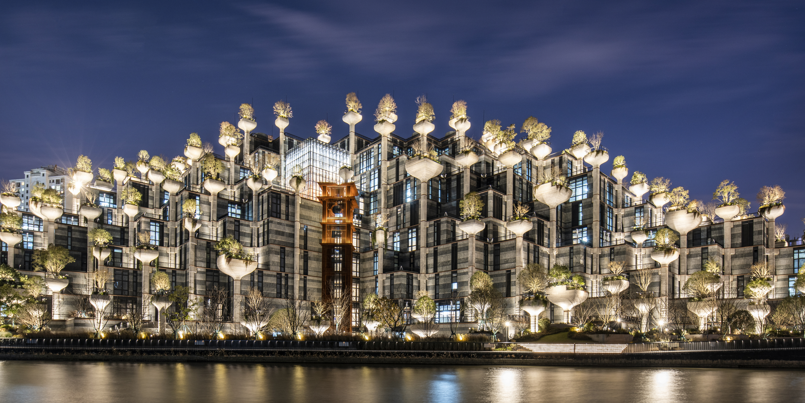 Shanghai’s 1000 Trees turns repetition into a night-time silhouette.